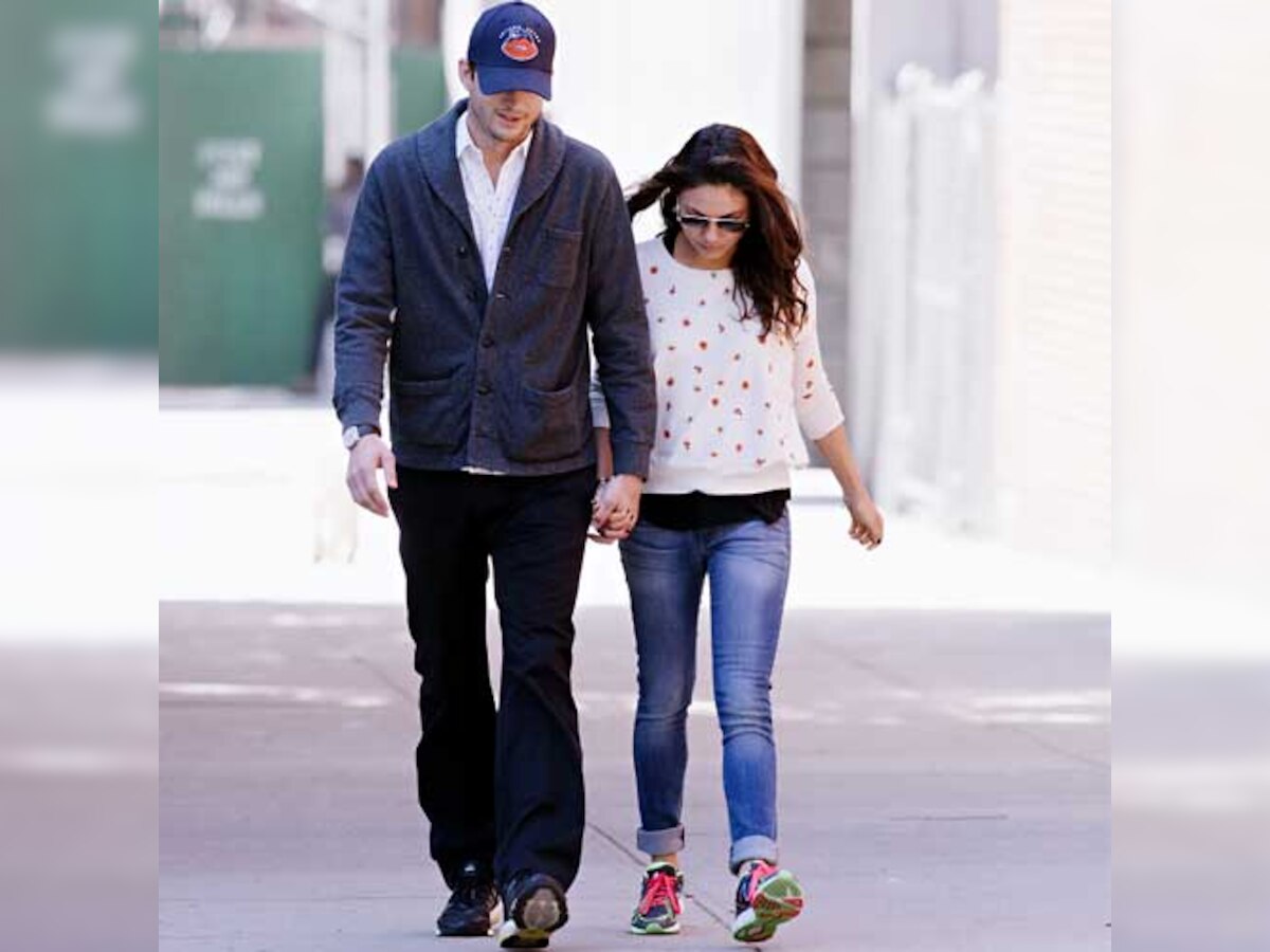 Mila Kunis' 'first kiss was with Ashton Kutcher'