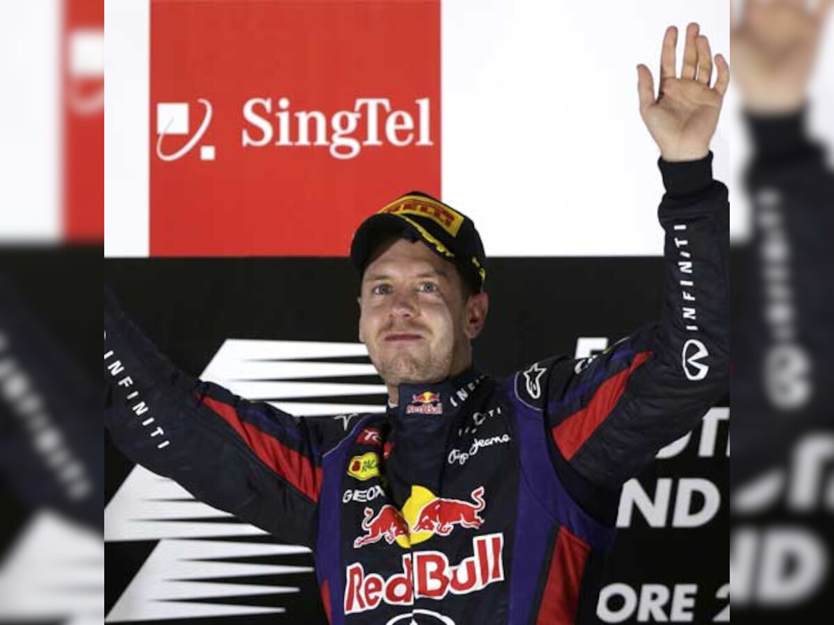 Sebastian Vettel eases to Singapore hat-trick