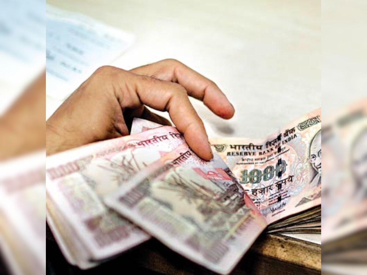 Rupee down 20 paise against dollar in early trade