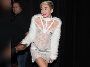 Miley Cyrus performs in pasties, see-through dress at iHeartRadio Music  Festival