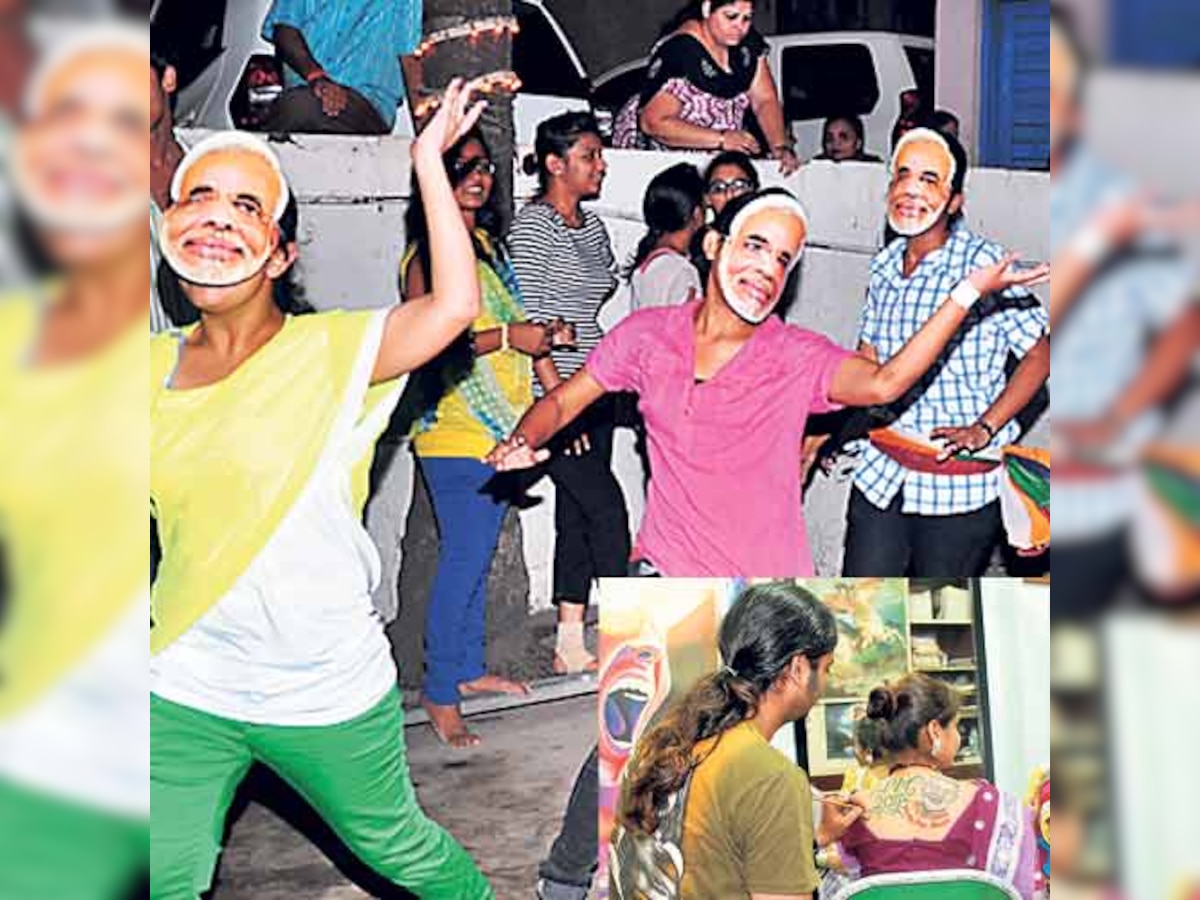Narendra Modi tattoo and masks dazzle at Surat Navratri venues