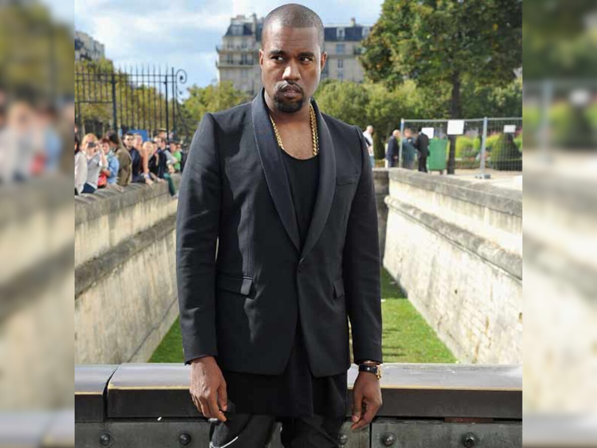 Kanye West wears 'controversia' confederate flag on jacket sleeve