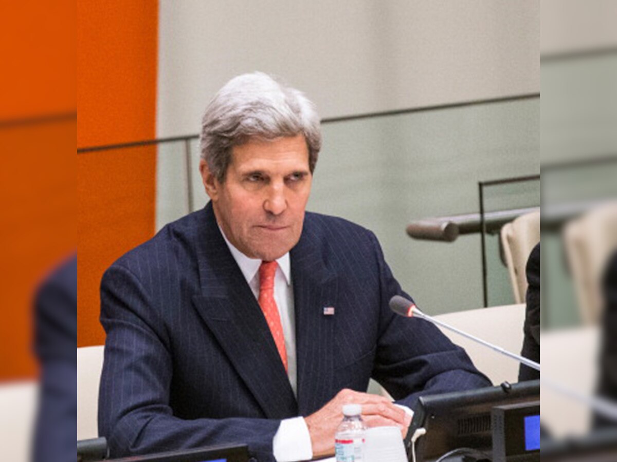 US Secretary of State John Kerry speaks to the press upon his arrival in Geneva