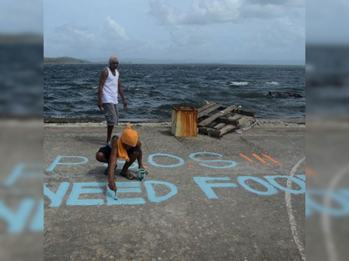 Philippine typhoon survivors beg for help as rescuers struggle