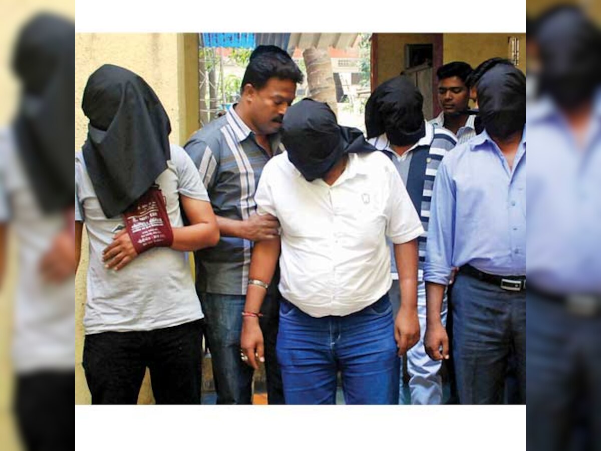 Four held for firing near Belapur bar