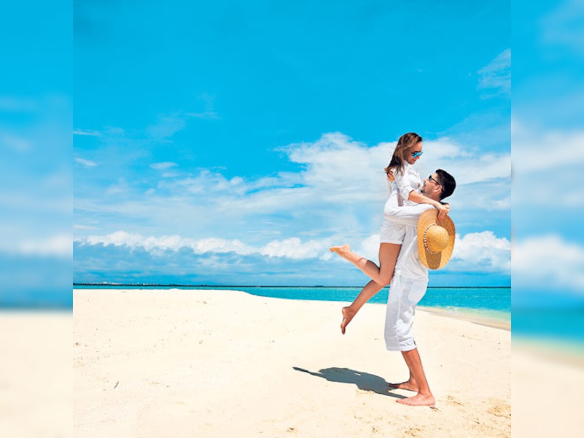 Newly-weds prefer mooning on the beach