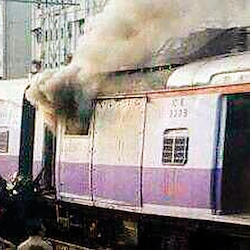 Local train catches fire at Thane station, no casualties