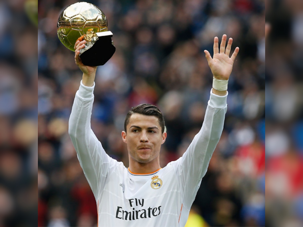 Cristiano Ronaldo's Ballon D'or win celebrated by fans as they turn Santiago Bernabeu stadium golden