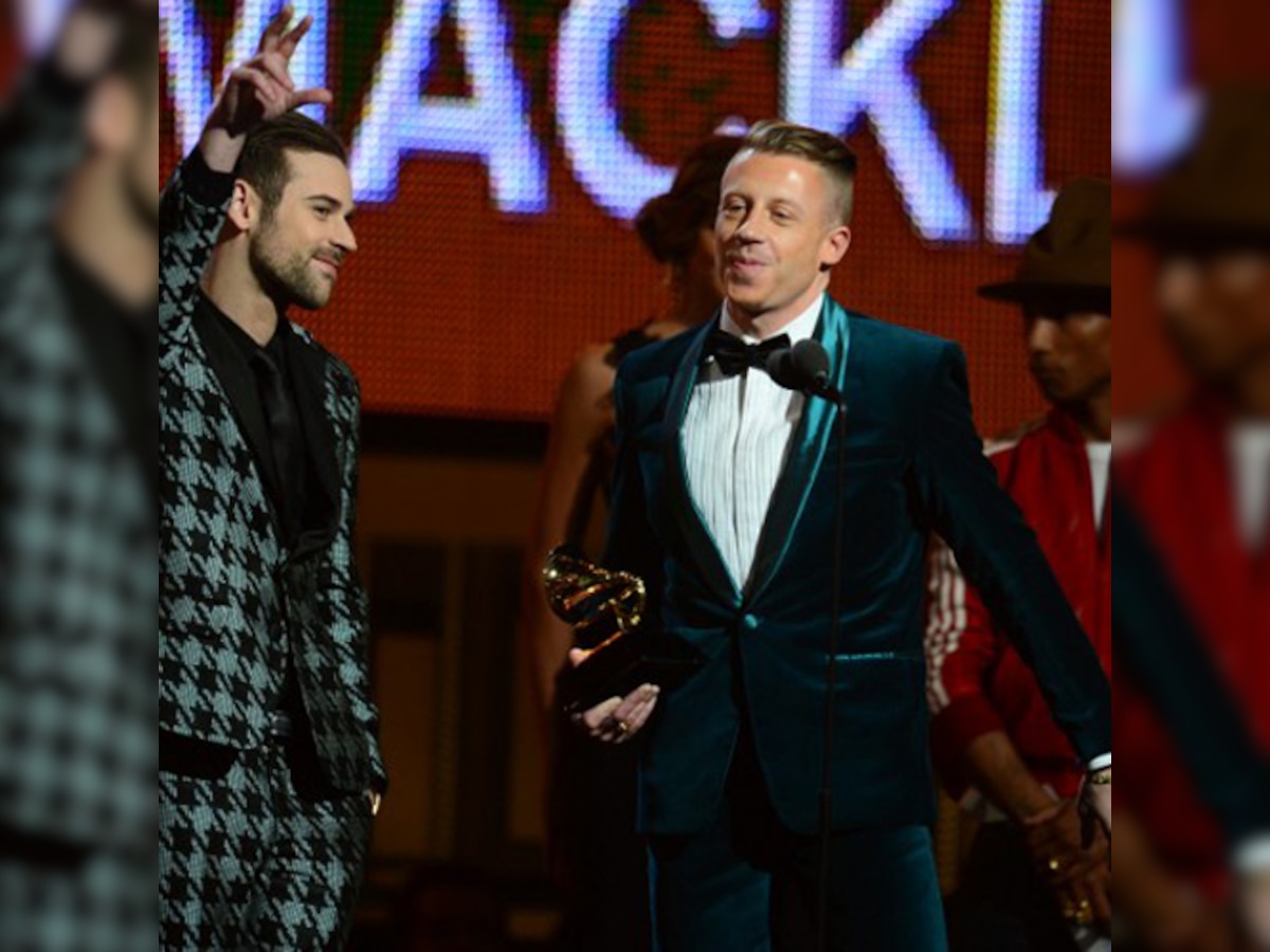 Macklemore & Ryan Lewis win best new artist, Beyonce opens Grammys