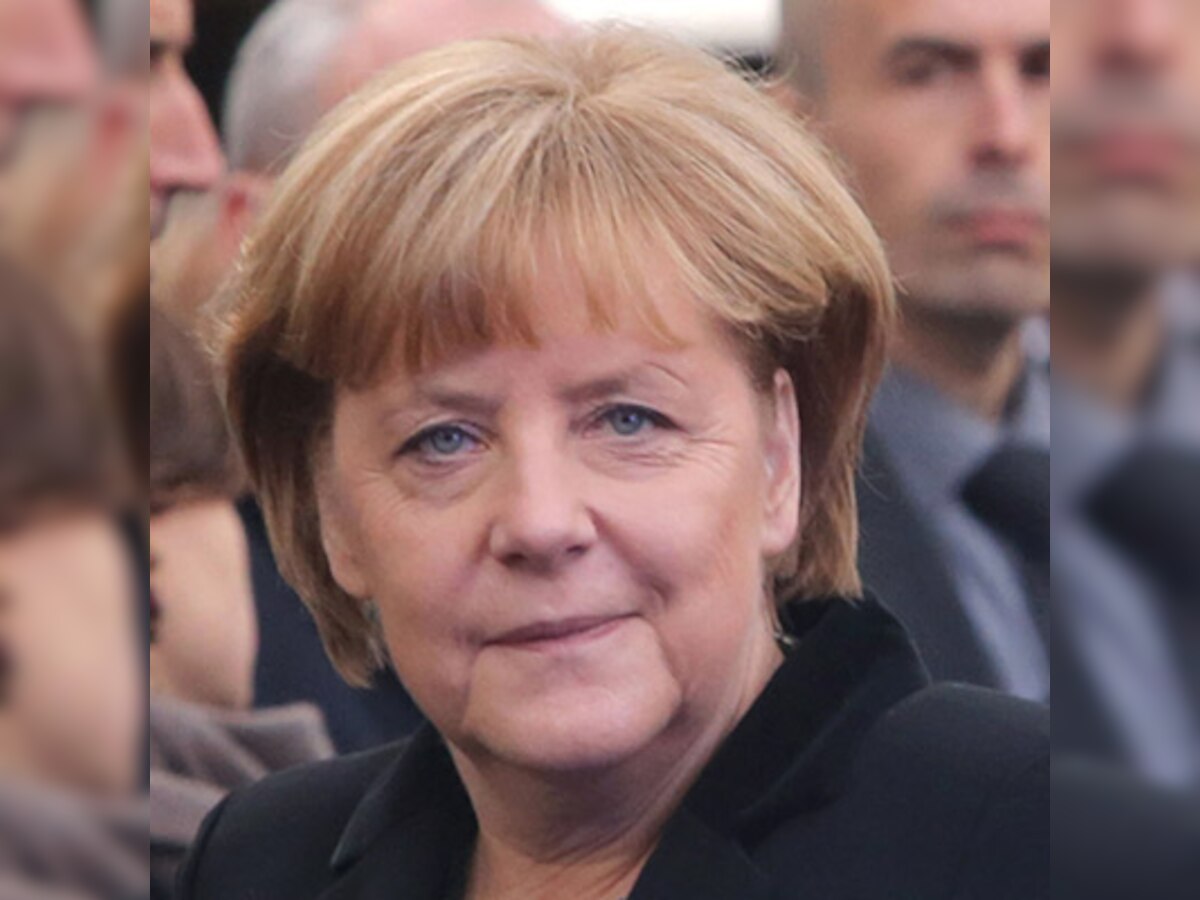 Angela Merkel warns of 'massive damage' to Russia if it fails to change course