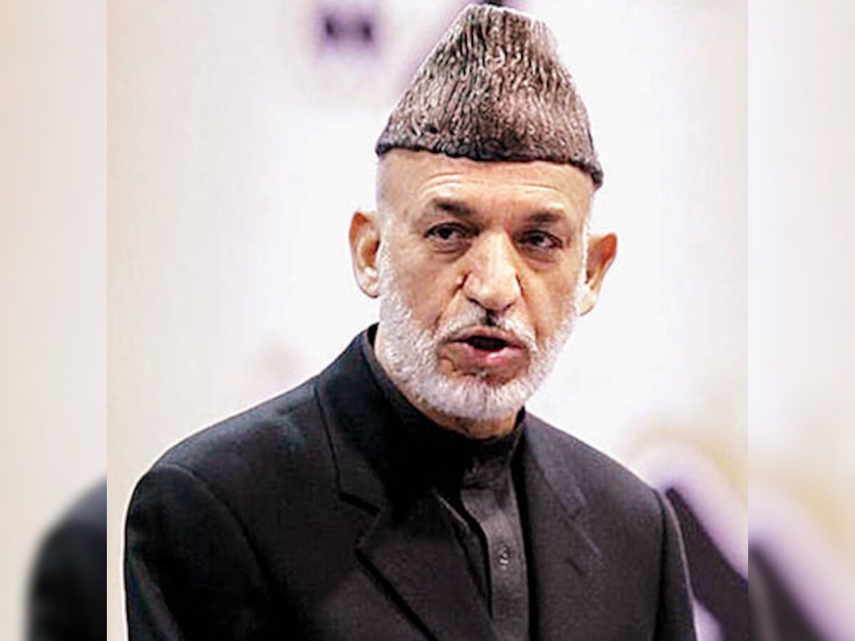 Afghan President Hamid Karzai pledges transparent elections