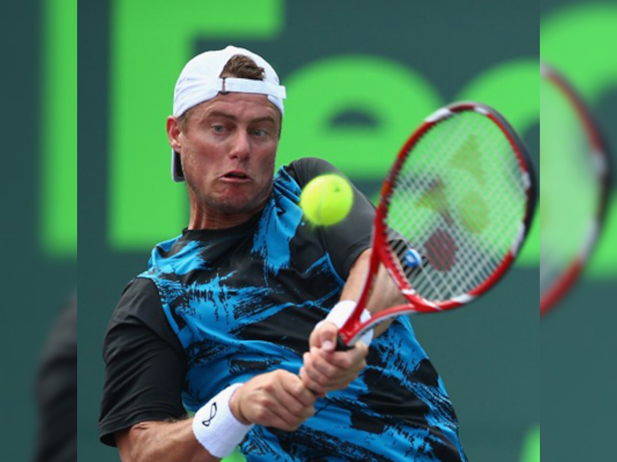 Battling Lleyton Hewitt scraps way to milestone 600th career win
