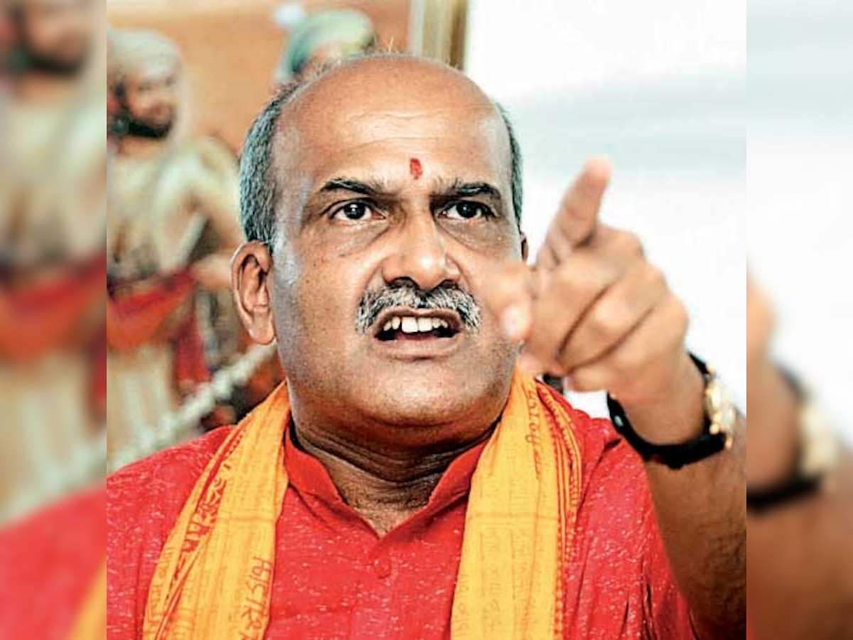 BJP inducts Pramod Muthalik notorious for attack on women in pub 