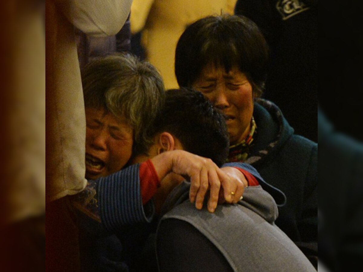 Flight MH370 crashed at sea, says Malaysian PM Najib Razak