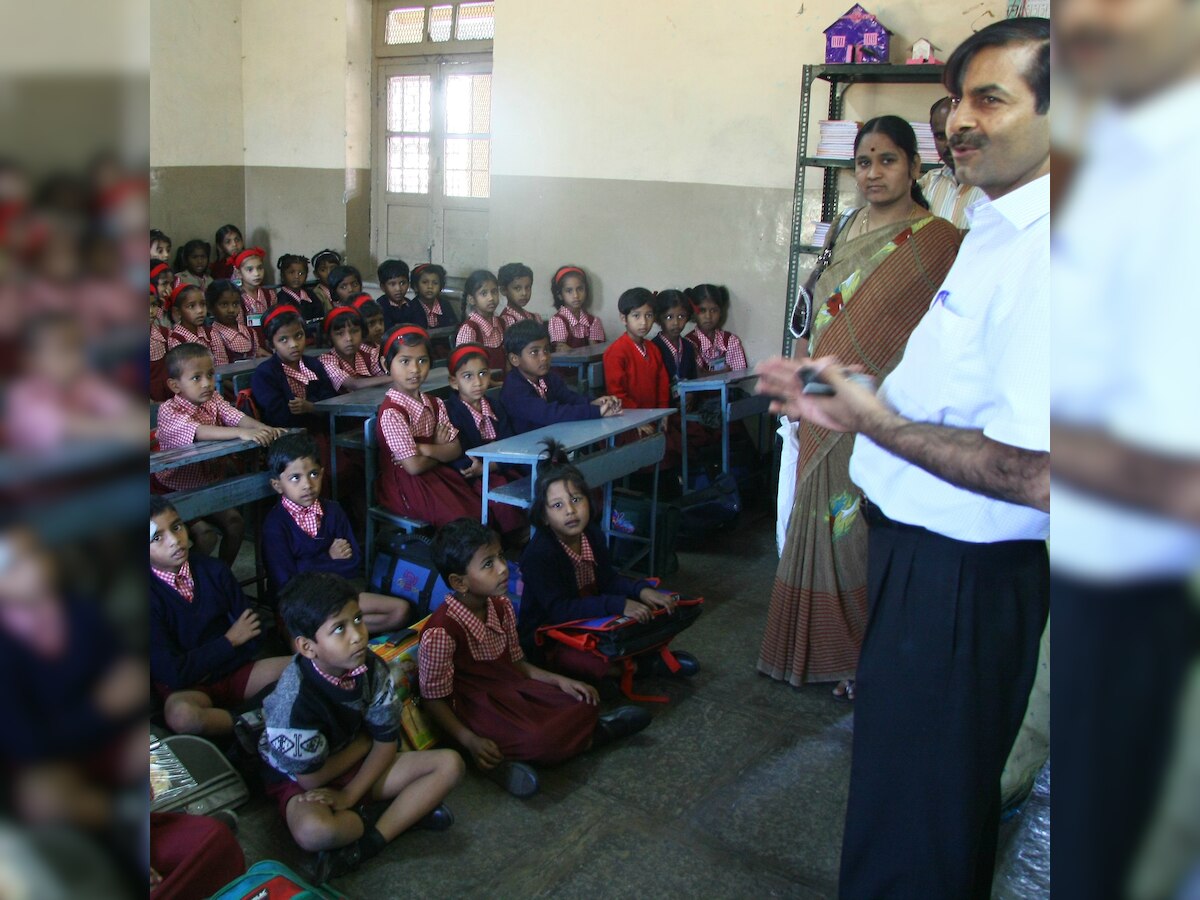 119 benches donated, but kids still sit on floors