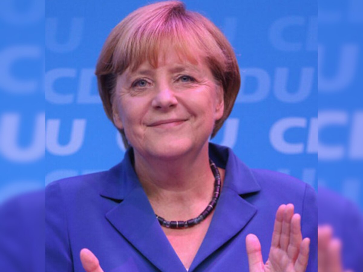 Angela Merkel tells China's President Xi free expression is vital