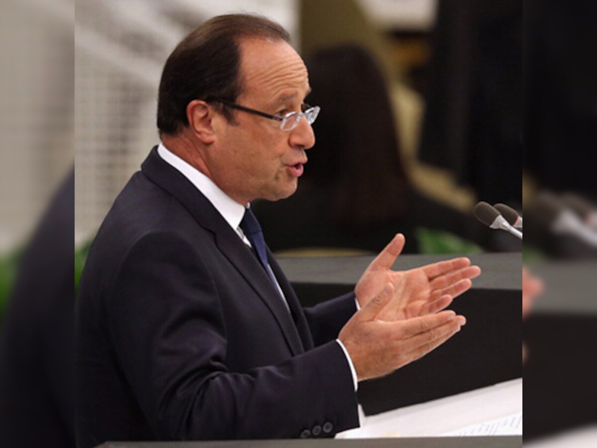 French Left urges Francois Hollande to drop reforms