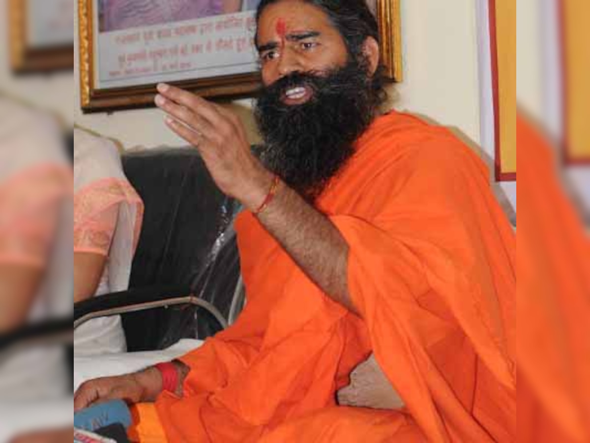 Bihar minister Shyam Razak slaps Baba Ramdev with case