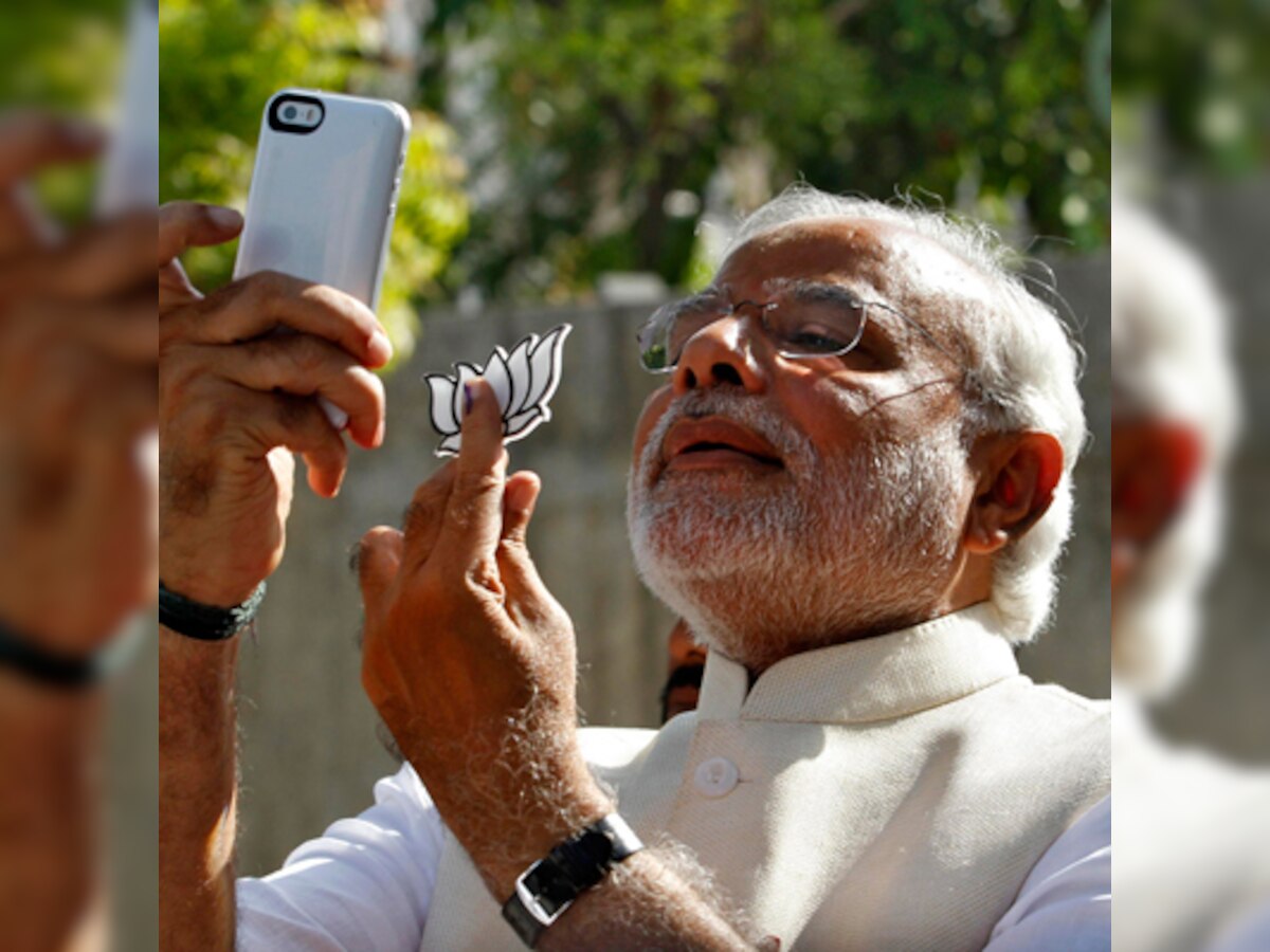 Congress, JD(U) demand Narendra Modi's arrest on the lotus selfie controversy