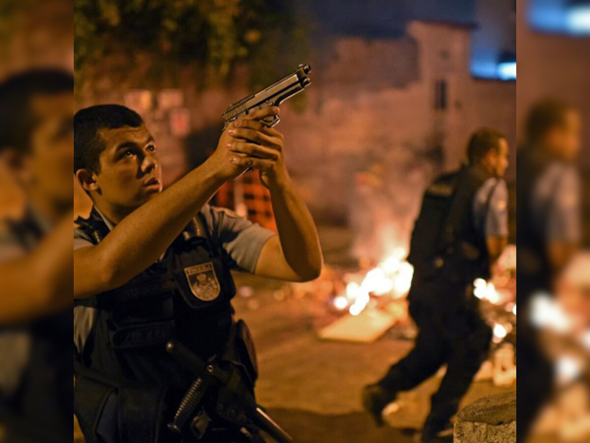 One dead as violent protests erupt in Rio de Janeiro over FIFA World Cup