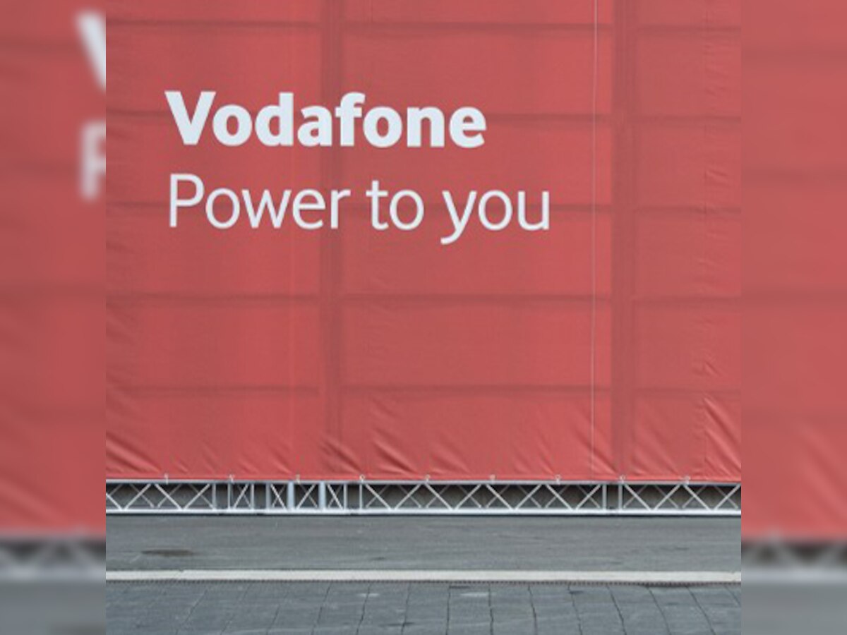 Vodafone says 2015 earnings to fall on investment plans