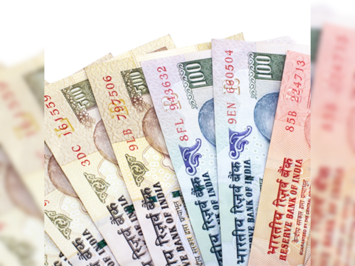 Rupee down 7 paise against dollar in early trade