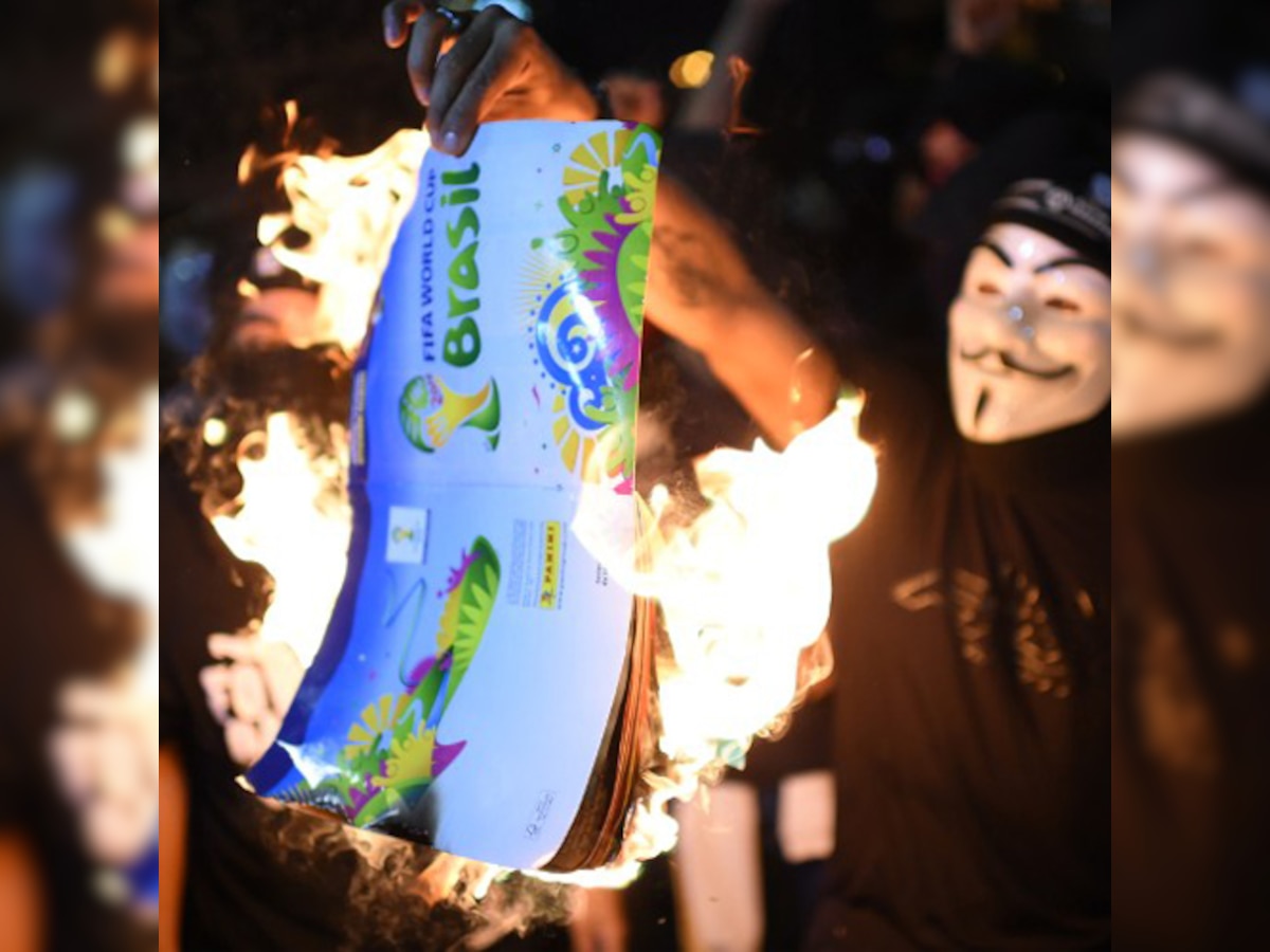 Brazilian Police and protesters clash as the FIFA World Cup is just a few hours away