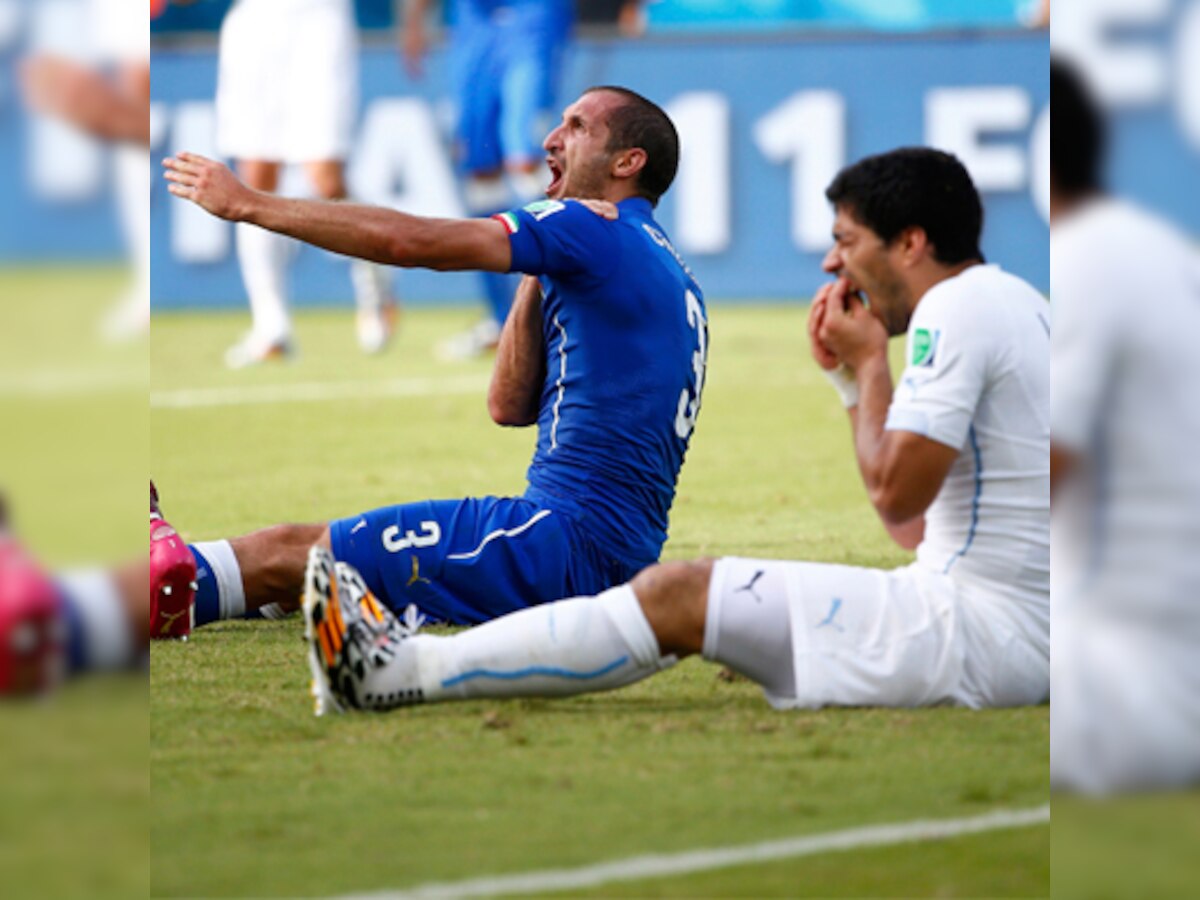 FIFA disciplinary committee asks Luis Suarez to present case before Colombia match; likely to face two-year ban