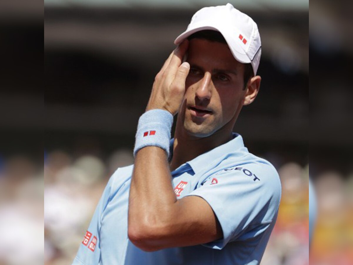 Novak Djokovic through to last 16 after injury scare
