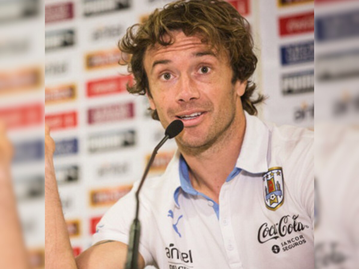 Uruguay defender Diego Lugano labels Luis Suarez ban as a 'breach of human rights'