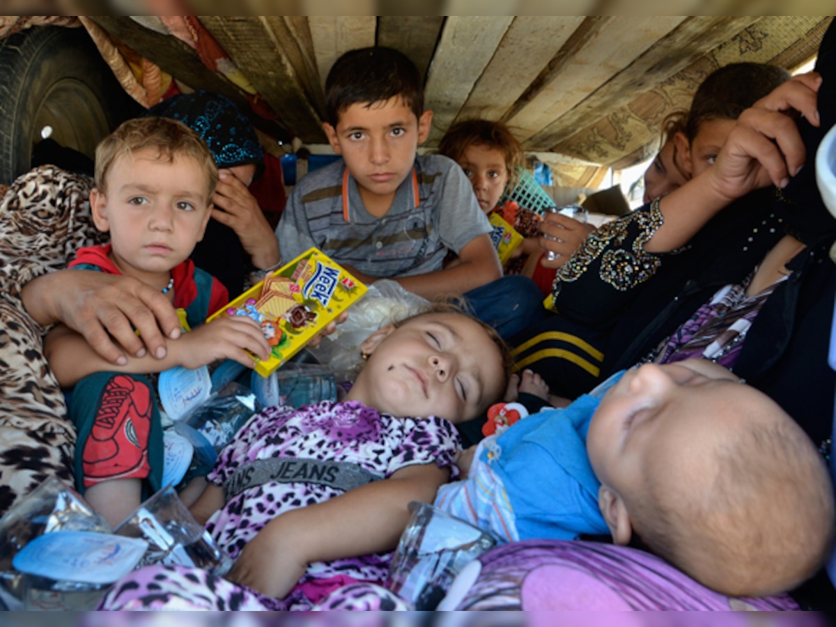 Up to 70% Yazidis stuck in Mount Sinjar may be dead after capture of town by Islamic State, claims British newspaper 