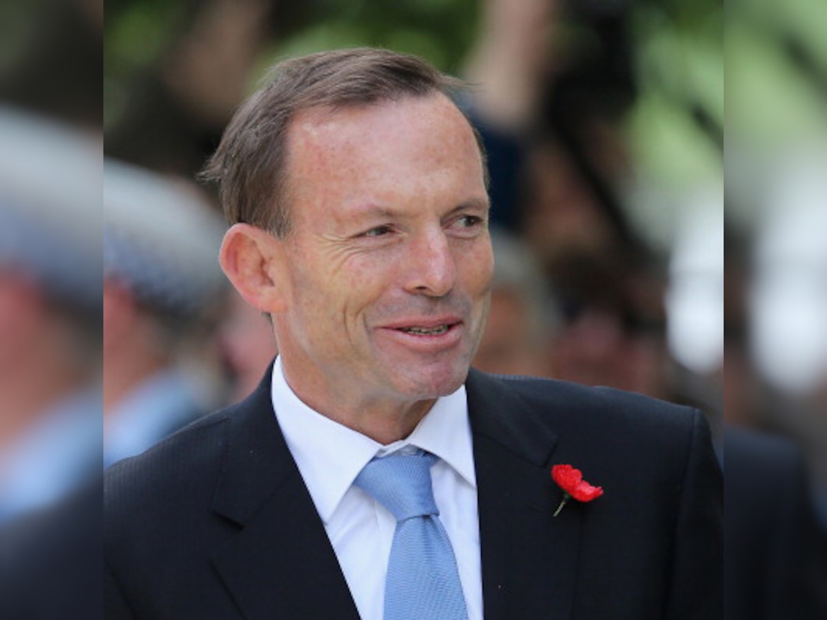 Australian PM Tony Abbott says police raids follow threat of beheading; raids come days after terror threat level raised to 'high'