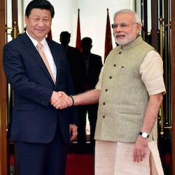 Narendra Modi urges to resolve border dispute as Xi Jinping invites Modi to China