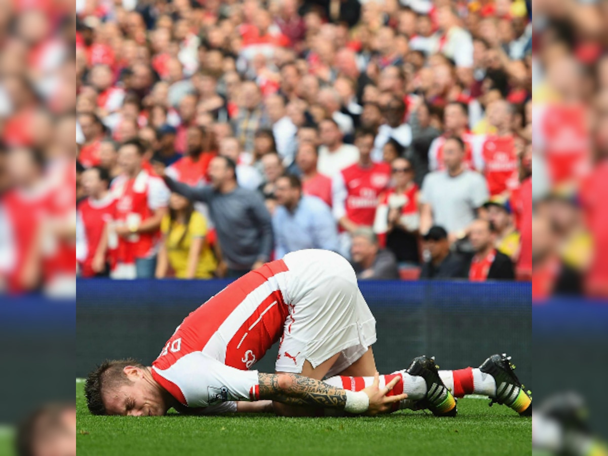 Mathieu Debuchy out for at least six weeks, says Arsene Wenger