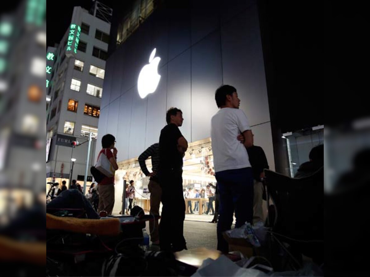 Why do Apple faithful continue to line up for latest, larger iPhones