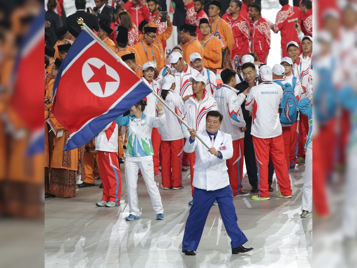 Asian Games: South Korean crowd cheers North Korean athletes, who stare on blankly in response