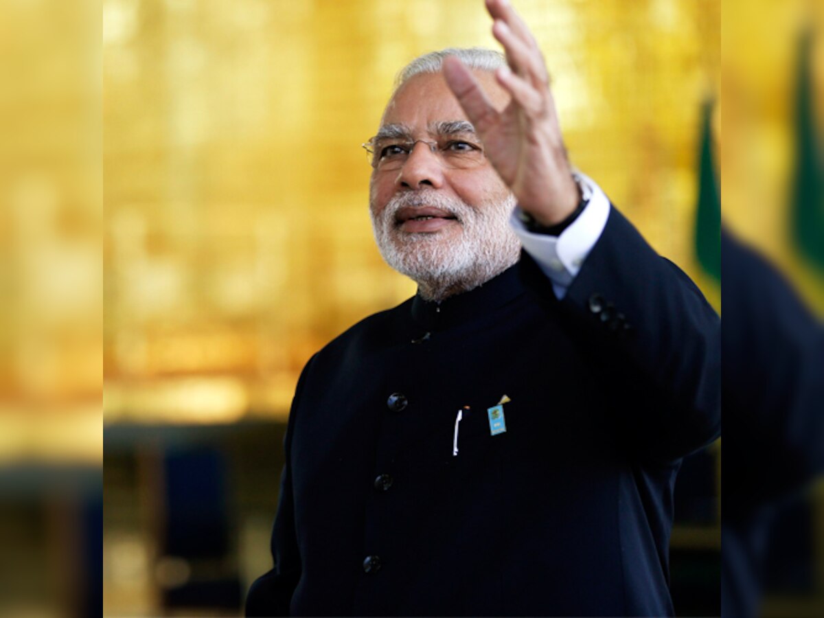 I want to win confidence of the people with my actions and not mere speeches: Narendra Modi