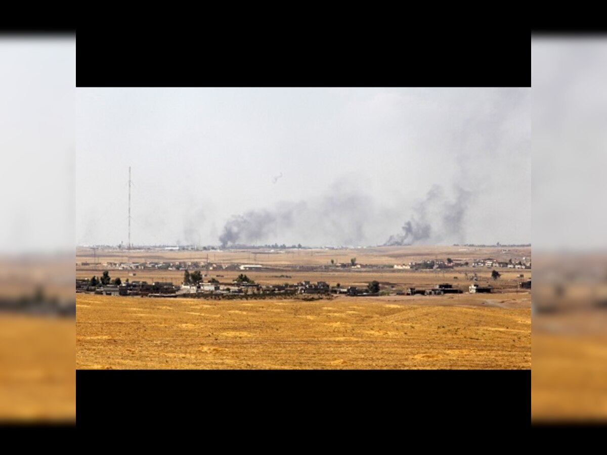 Air strikes in Syria hit Islamic State and al Qaeda-linked Nusra Front