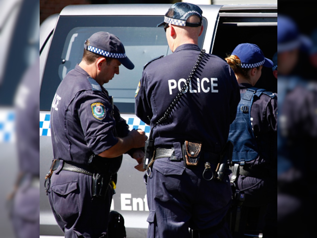 Australian police kill 'terror suspect' after two officers were stabbed