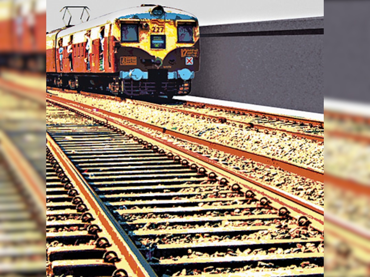 Woman jumps in front of train with 2 kids, younger son survives