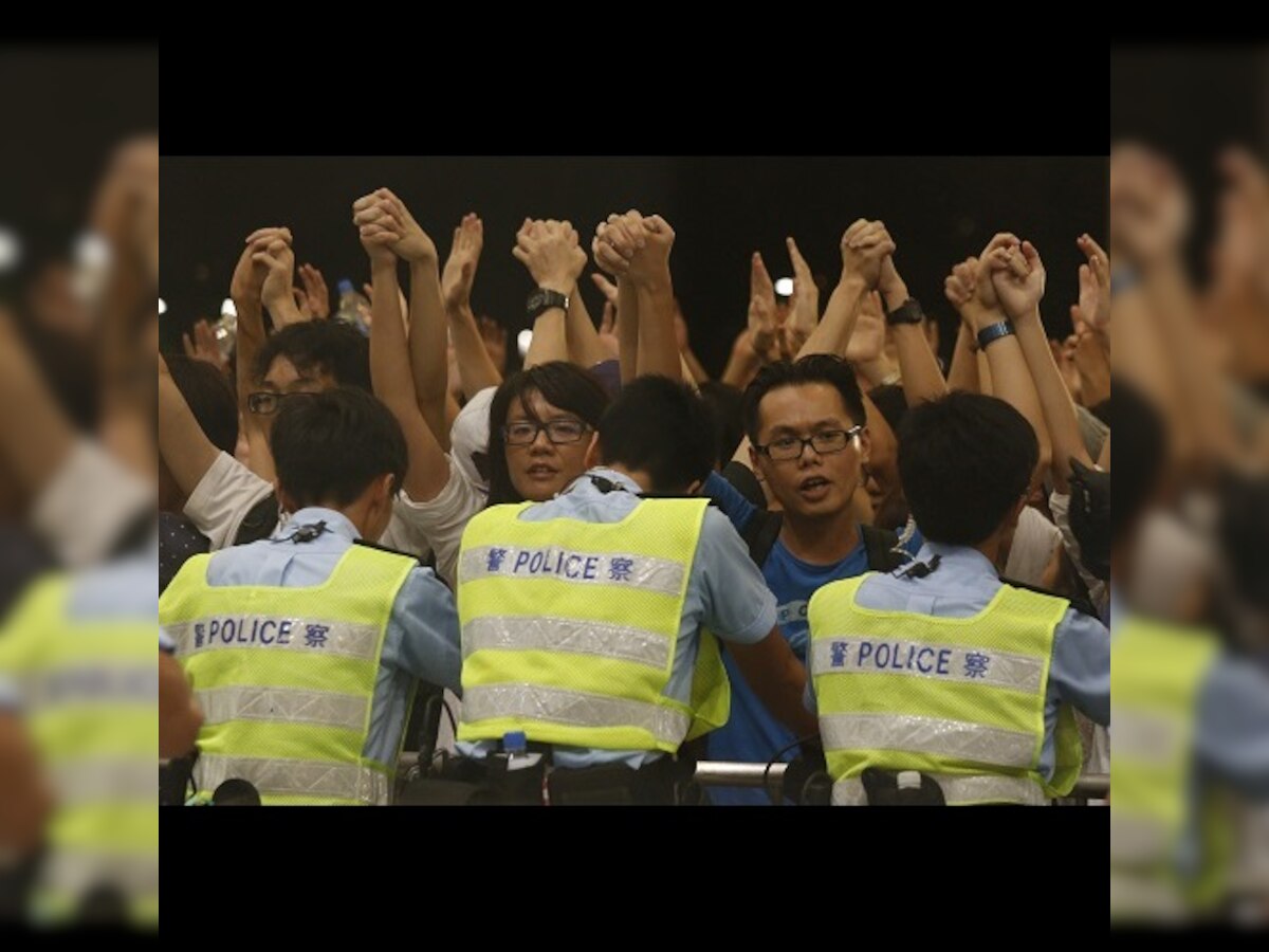 Hong Kong pro-democracy rally: Police-student clashes spur plans to blockade city