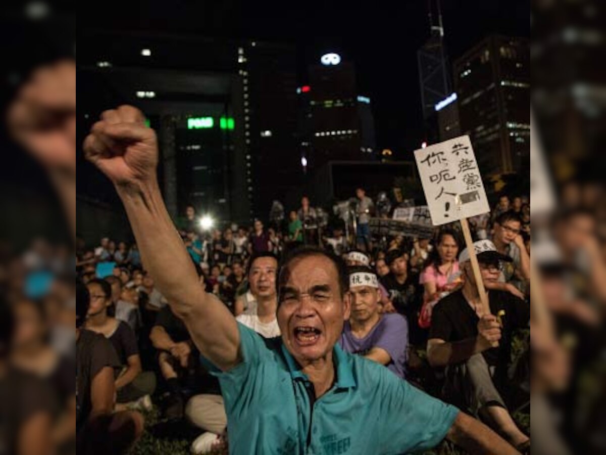 Democracy protestors ignore Hong Kong leader Leung Chun-ying's call to end demonstrations