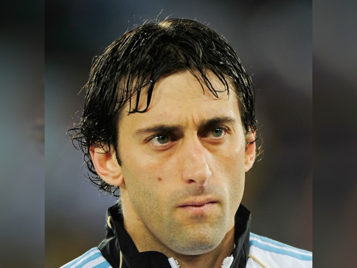 Diego Milito's brace takes Racing Club on brink of Argentine league glory