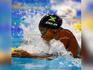 Jamaican Alia Atkinson becomes first black swimmer ever to win in world ...