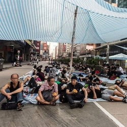 Hong Kong pro-democracy activists agree to talks as protesters' numbers dwindle