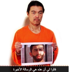 New video of Islamic State captive journalist Kenji Goto 'despicable', says Japan PM Shinzo Abe