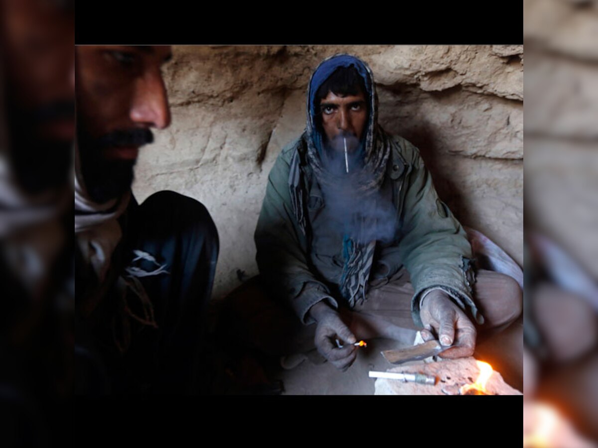 Awash in opium, Afghan "wild west" slips from Kabul's grasp