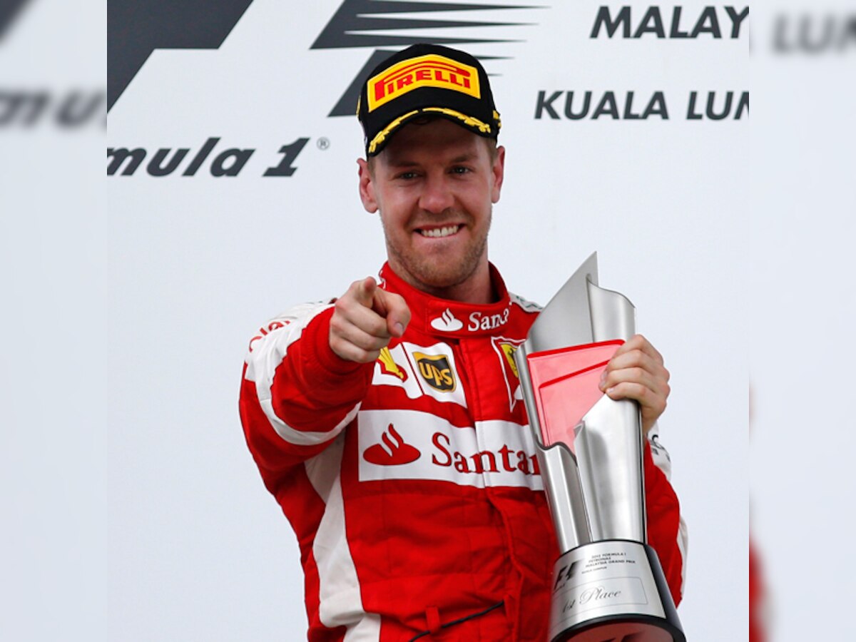 Formula One: Ferrari's Sebastian Vettel storms to Malaysia win