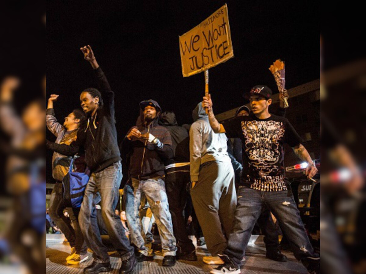 Baltimore heads into weekend of rallies after officers charged over Freddie Gray death