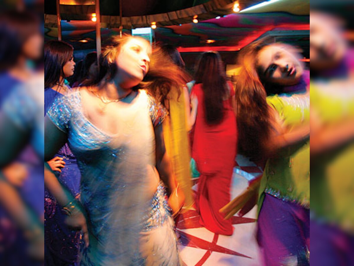 Assistant police inspector suspended for shaking leg, showering cash in dance bar